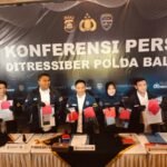 Polda Bali mengungkap dua kasus penipuan online bermodus tawaran kerja di luar negeri.